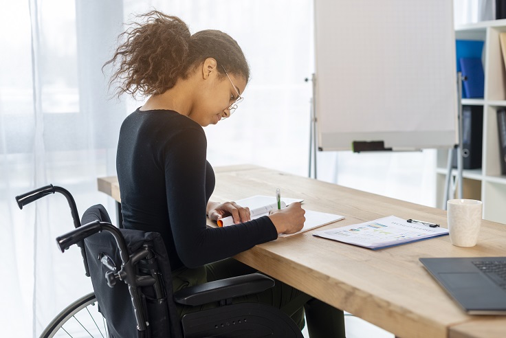 portrait-young-signing-papers-office